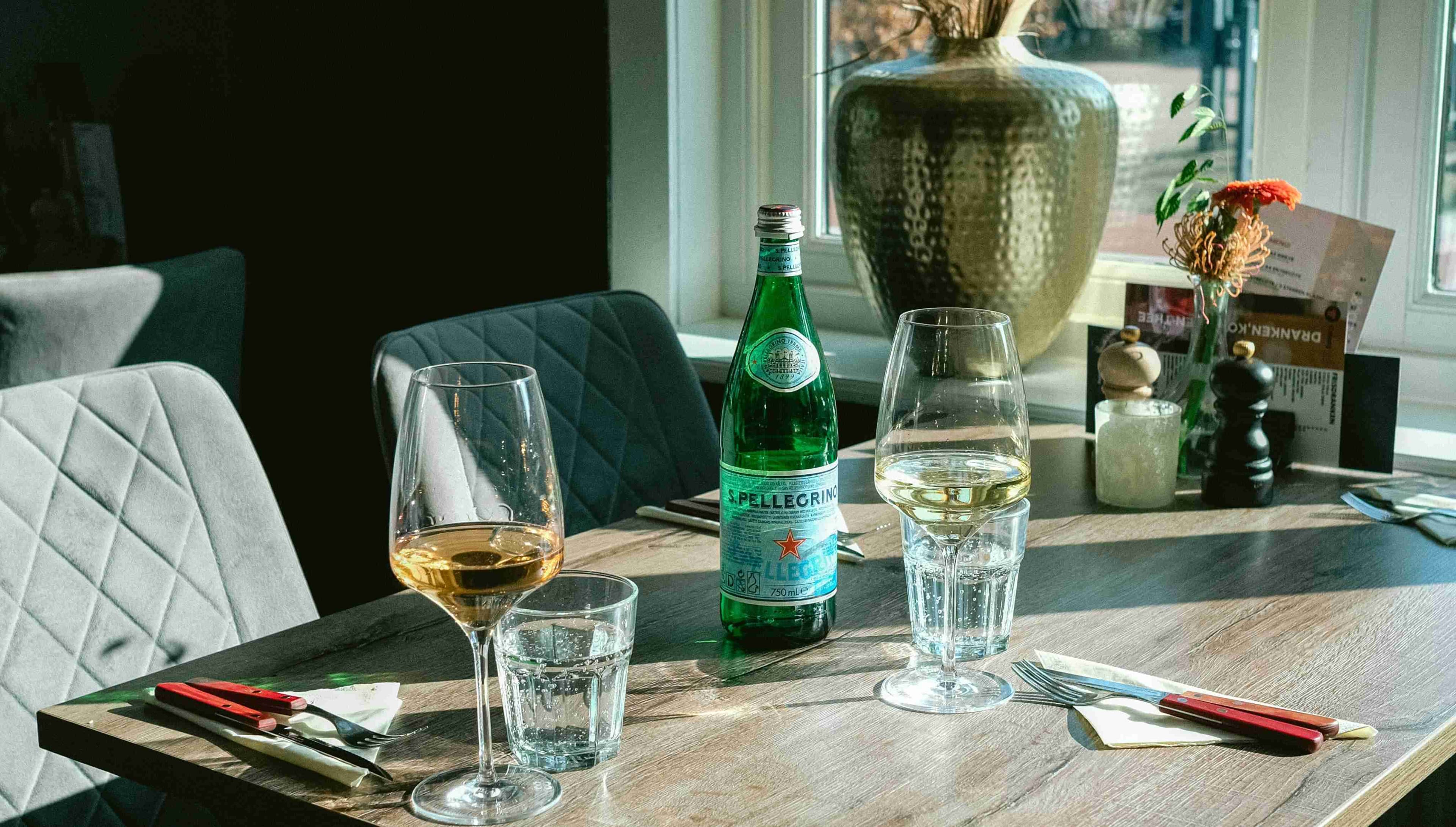 Hero afbeelding van een sfeervol event in Jack’s Colony Grill, met een prachtige netjese tafel